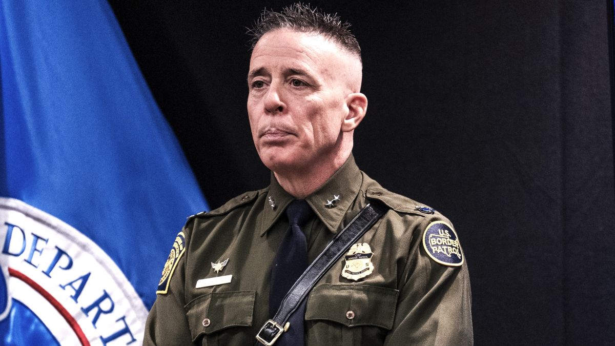 Border Patrol Commander Gregory Bovino looks on during a press conference at the Bishop Henry Whipple Federal on January 22, 2026 in Minneapolis, Minnesota. Bovino, joined by ICE Executive Associate Director of Enforcement and Removal Operations Marcos Charles, addressed ongoing immigration enforcement operations in the state. The Trump administration has sent a reported 3,000 federal plus federal agents into the area, with more on the way, as they make a push to arrest undocumented immigrants in the region. (Photo by Stephen Maturen/Getty Images)