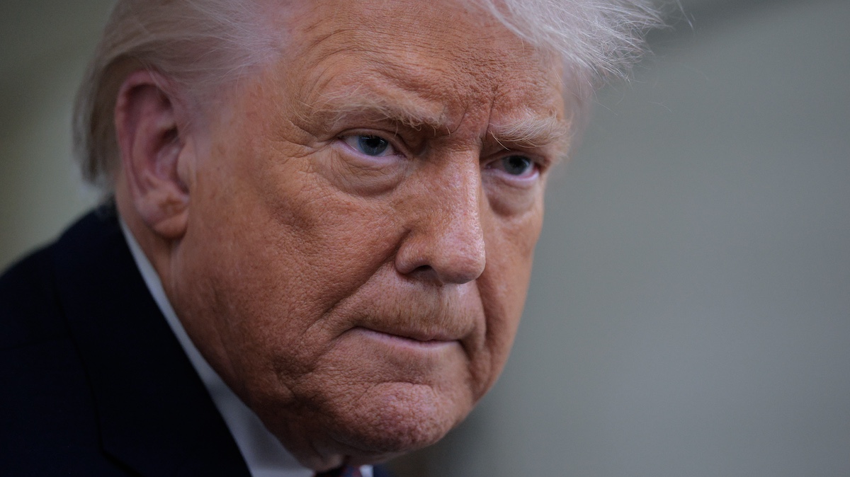 IN FLIGHT - JANUARY 22: U.S. President Donald Trump speaks to reporters on board Air Force One while flying in between Ireland and Washington as he returns from the World Economic Forum on January 22, 2026. Following a meeting with NATO Secretary General Mark Rutte, Trump announced a deal with European leaders on the semi-autonomous Danish territory of Greenland during the annual meeting of political and business leaders in Davos.