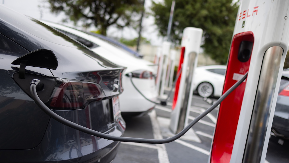 HAWTHORNE, CALIFORNIA - MAY 2: Tesla cars are seen parked and charging at a Tesla Supercharger on May 2, 2025 in Hawthorne, California.