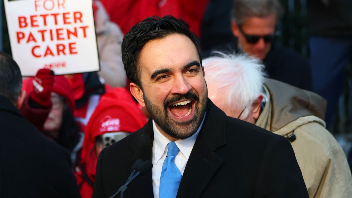 Mayor Zohran Mamdani speaks to nurses from Mount Sinai West striking outside the hospital on January 20, 2026 in New York City. Sen. Bernie Sanders (I-VT) and Mayor Zohran Mamdani joined striking nurses with the New York State Nurses Association on the picket line on the eighth day of their walkout. Nearly 15,000 nurses from NYC's biggest hospital have gone on strike demanding higher wages, more security at hospitals to reduce violent episodes and shootings, and a commitment to ensuring minimum staffing ratios. (Photo by Michael M. Santiago/Getty Images)