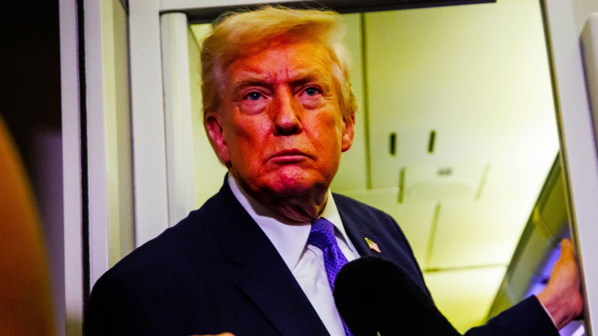 U.S. President Donald Trump gaggles with reporters while aboard Air Force One on February 6, 2026 en route to Palm Beach, Florida. The President is spending the weekend at Mar-a-Lago, his private club. (Photo by Samuel Corum/Getty Images)