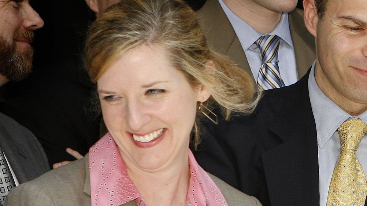 Prosecuting attorneys Sean Brekowitz (C), Kathryn Ruemmler (L), Cliff Striklin (2nd R), and John Hueston share a laugh outside of the Bob Casey U.S. Courthouse after the fraud and conspiracy trial of former Enron executives Kenneth Lay and Jeff Skilling, May 25, 2006, in Houston. After sixteen weeks of testimony and six days of deliberation, the jury found Lay guilty on all counts and Skilling guilty on nineteen counts. Judge Sim Lake also found Lay guilty on all counts in his banking trial. (Photo by Dave Einsel/Getty Images)