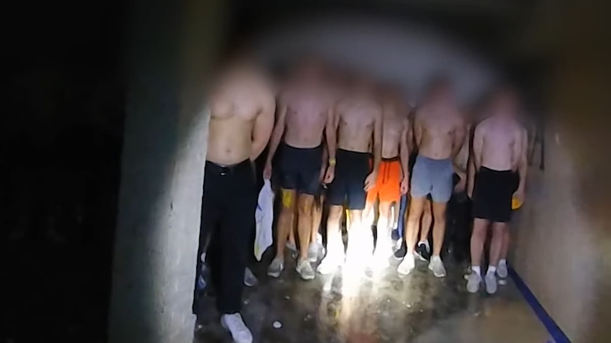 University of Iowa students in basement