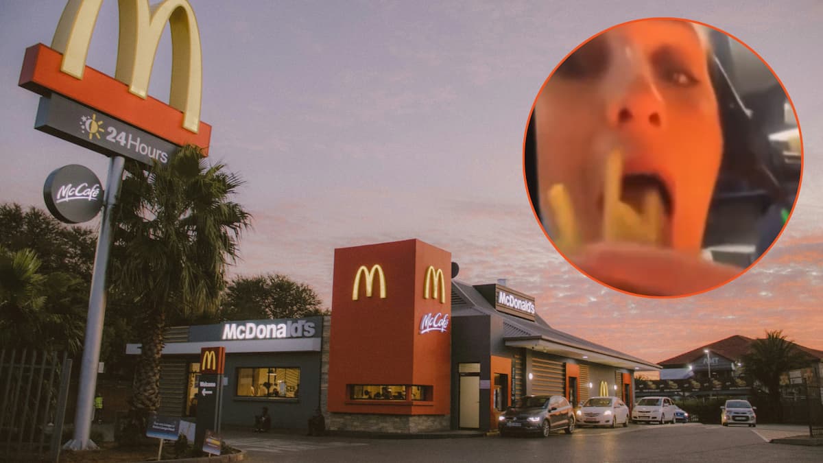 red and white concrete building near palm trees during daytime AKA McDonald's