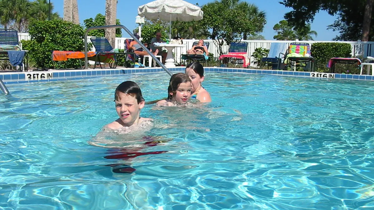 Mom sparks online debate after threatening to call cops on neighbors over an unfenced pool near her toddler