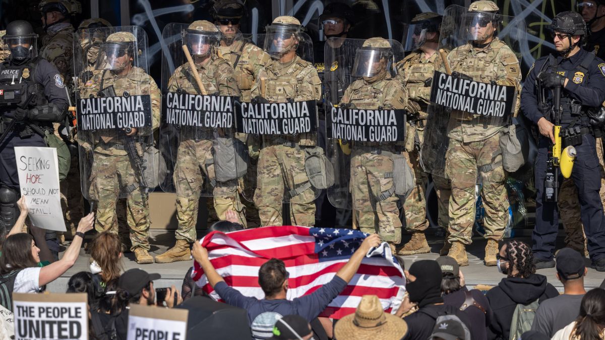 Protesters confront California National Guard soldiers and police outside of a federal building as protests continue in Los Angeles following three days of clashes with police after a series of immigration raids on June 09, 2025 in Los Angeles, California. Tensions in the city remain high after the Trump administration called in the National Guard against the wishes of city leaders. (Photo by David McNew/Getty Images)