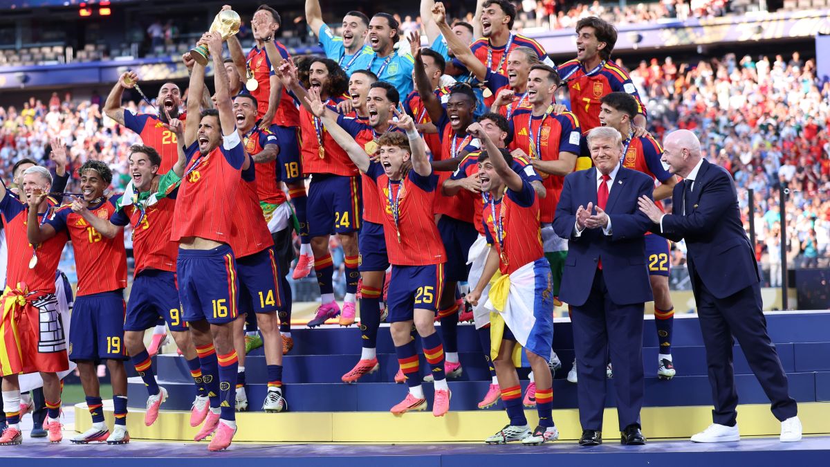 FIFA President Gianni Infantino with President of the United States Donald J. Trump as Rodri of Spain lifts the FIFA World Cup trophy after the FIFA World Cup 2026 Final match between Spain and Argentina at New York New Jersey Stadium on July 19, 2026 in East Rutherford, New Jersey. (Photo by Catherine Ivill - AMA/Getty Images)