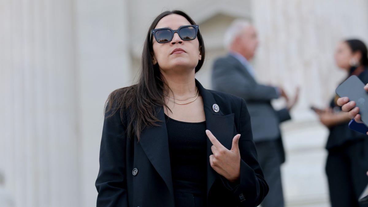 U.S. Rep. Alexandria Ocasio-Cortez (D-NY) speaks to reporters on the House steps after a series of votes at the U.S. Capitol on July 22, 2026 in Washington, DC. The House of Representatives passed legislation funding for the 2027 NDAA defense programs and banned insider stock trading among lawmakers. (Photo by Anna Moneymaker/Getty Images)