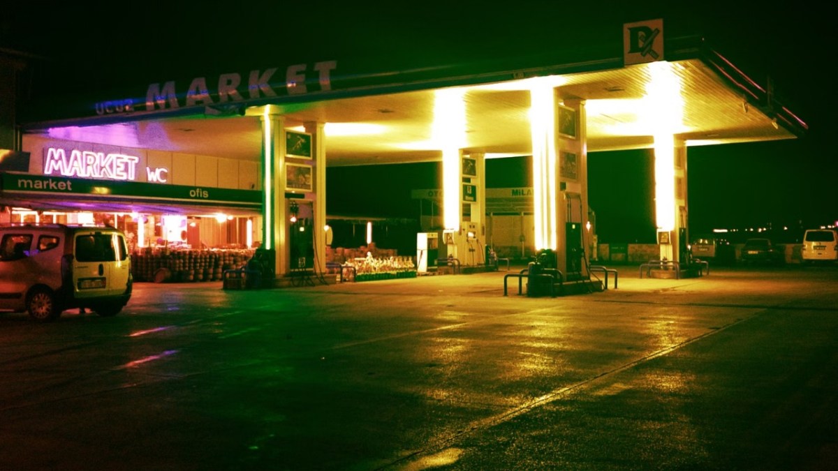 An empty gas station at night