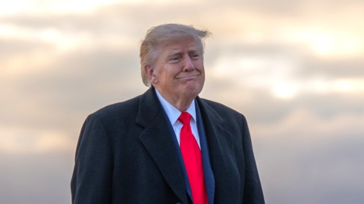 Donald Trump walks on a runway