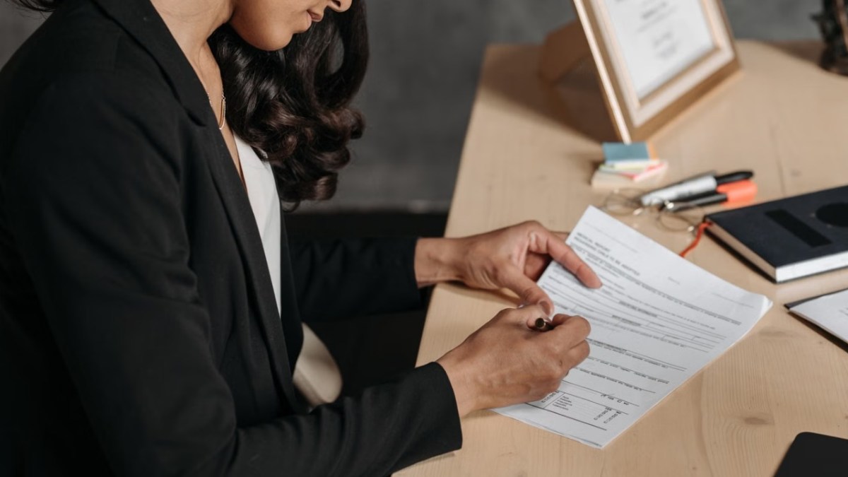 A female lawyer working on documents