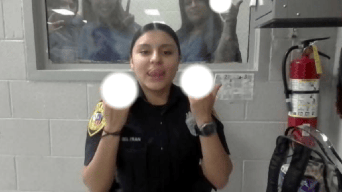 Deputy Karla Beltran posing for photos with inmates